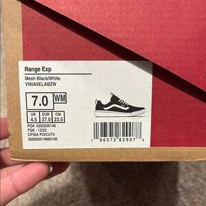 Vans Women’s Black and White Sneakers